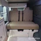 Spartan campers VW campervan conversion with winter floor, latte and Winchester oak kitchen and liquor upholstery. Fitted with a fabworx rock and roll bed