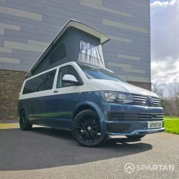 Spartan Campers VWT6 long wheel base campervan in bamboo and candy white. front drivers quarter with roof up