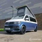 Spartan Campers VWT6 long wheel base campervan in bamboo and candy white. front passenger quarter with roof up