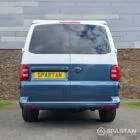 Spartan Campers VWT6 long wheel base campervan in bamboo and candy white. rear straight on with roof down