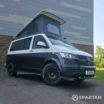 VW T6.1 campervan with full Spartan conversion. In starlight blue and candy white. Fitted with swamper wheels and a Fiamma F45 wind out awning