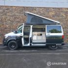 VW T6.1 campervan with full Spartan conversion. In starlight blue and candy white. Fitted with swamper wheels and a Fiamma F45 wind out awning