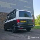 VW T6.1 campervan with full Spartan conversion. In starlight blue and candy white. Fitted with swamper wheels and a Fiamma F45 wind out awning