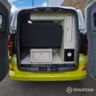 VW T7 Commerce Plus, SWB Spartan campervan conversion in Jaune Agued and Clear White. Fitted with a mobiframe bed