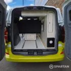 VW T7 Commerce Plus, SWB Spartan campervan conversion in Jaune Agued and Clear White. Fitted with a mobiframe bed