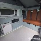 SWB VW T7 with full Spartan Campers conversion. With winter flooring, seagrass and white kitchen and toffee upholstery