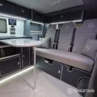 VW T7 with full Spartan Campers Conversion, featuring a rock and roll bed, captains seat, microwave, fridge/freezer, double gas hob, sink, touch screen savvy panel and hot water system