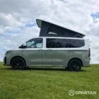 VW T7 SWB in Meadow Green passenger side, pop top up