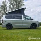 VW T7 SWB in Meadow Green drivers side, pop top up