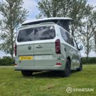 VW T7 SWB in Meadow Green rear driver quarter, pop top up