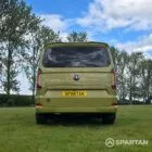 VW T7 SWB Spartan Campers campervan in warm metallic green, rear with pop top roof down