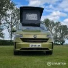 VW T7 SWB Spartan Campers campervan in warm metallic green, front with pop top roof up