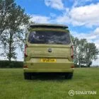VW T7 SWB Spartan Campers campervan in warm metallic green, rear with pop top roof up