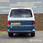 Direct rear view of the Spartan VW T6.1 SWB campervan displaying the Volkswagen badge and rear lighting.