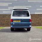 Direct rear view of the Spartan VW T6.1 SWB campervan displaying the Volkswagen badge and rear lighting.