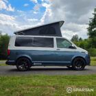 Driver's side profile of the Spartan VW T6.1 SWB campervan with colour-coded elevating roof, privacy glass and 20-inch alloy wheels.