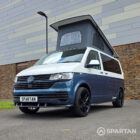 Front passenger side three-quarter view of the Spartan VW T6.1 SWB campervan parked outdoors